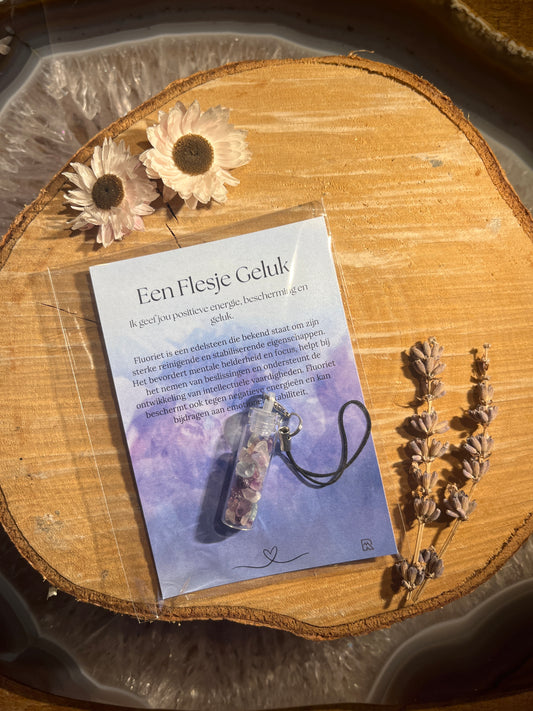 Fluoriet geluksflesje in zakje