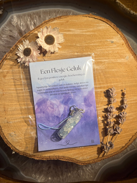 Aquamarijn geluksflesje in zakje